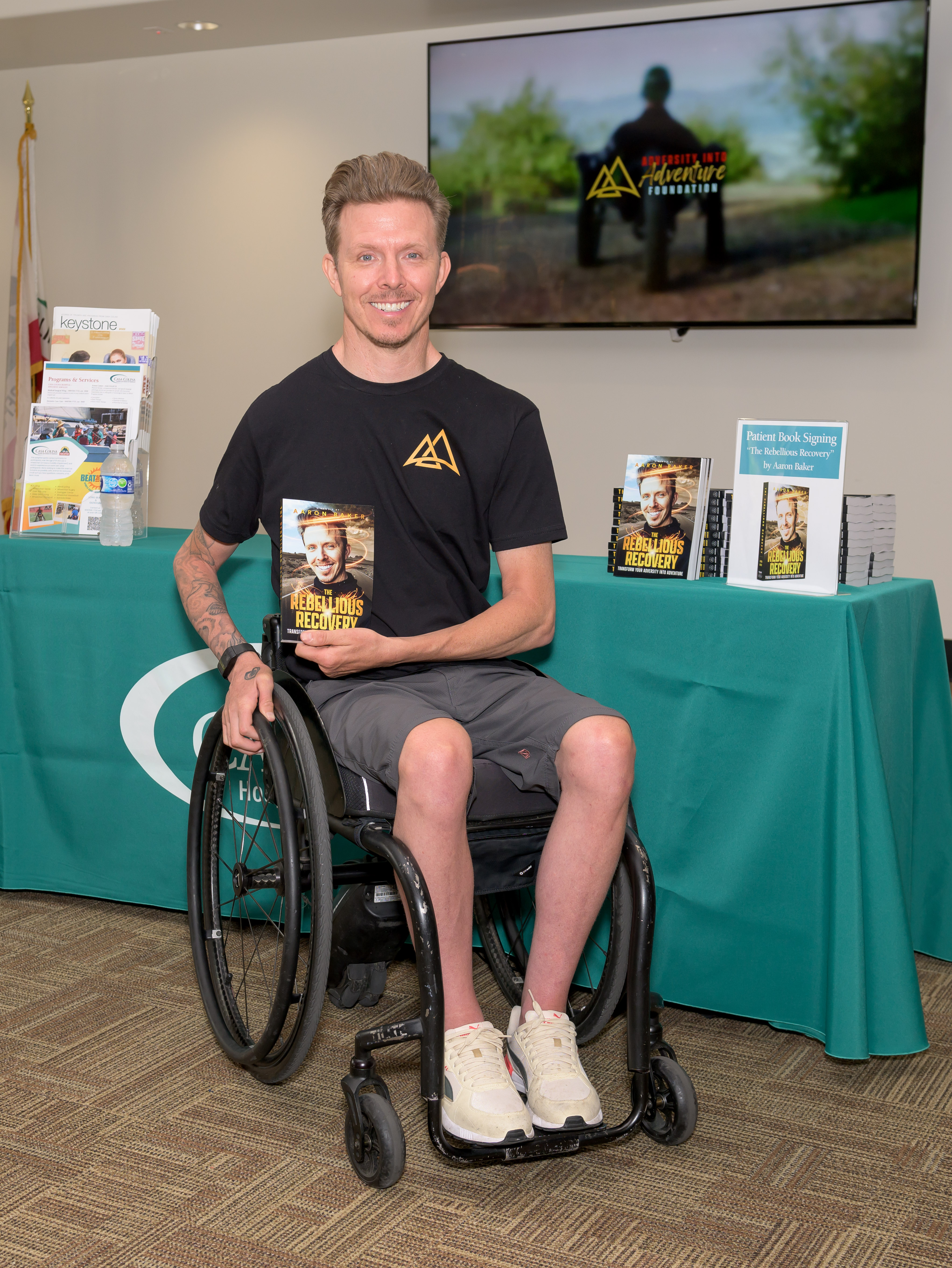 aaron baker holding book